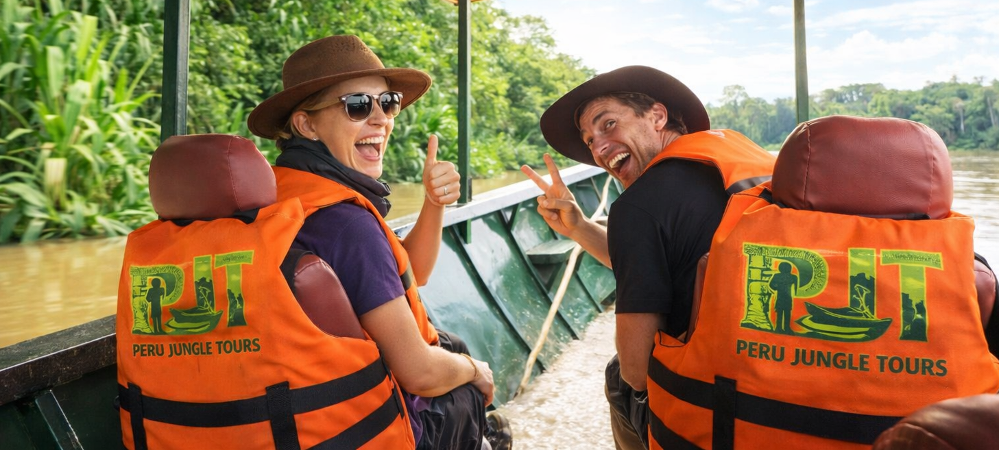 Jaguar on a log in the Amazon rainforest, Peru